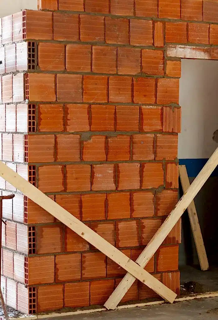 Masonry wall bricks. Building construction concept.